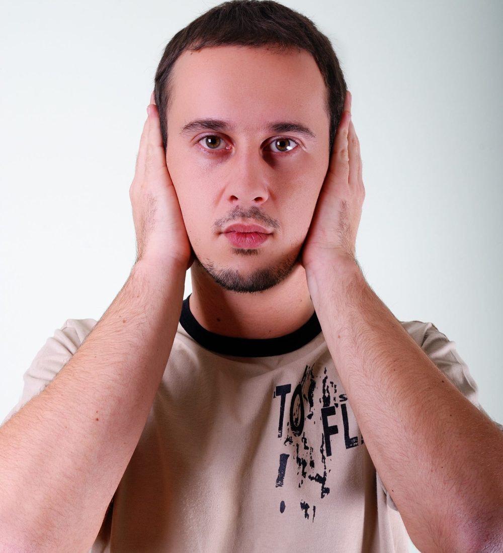 Handsome man expressing his inner feelings